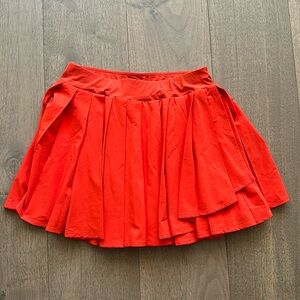 Outdoor Voices - SM - orange tennis skirt